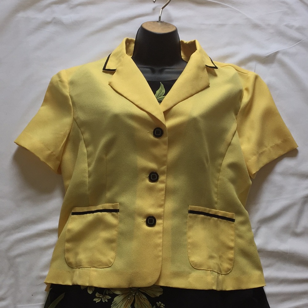 Gently used sundress with shirt sleeve jacket.